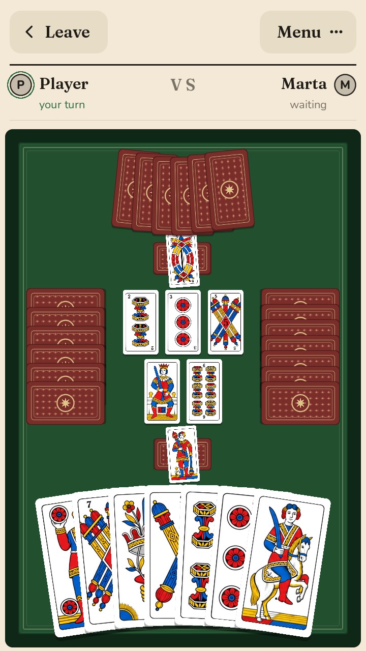 Scopone in pairs: your partner opposite, the opponents at the sides, seven cards in hand